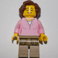 fig-009849 – Woman, Bright Pink Top, Dark Tan Legs, Reddish Brown Hair