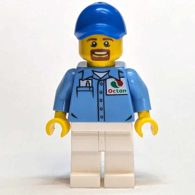 fig-009868 – Man, Medium Blue Shirt with Octan Logo, White Legs, Blue Cap, Goatee Beard