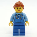 fig-009869 – Woman, Blue Overalls over Shirt, Dark Orange Hair, Dirt Stains