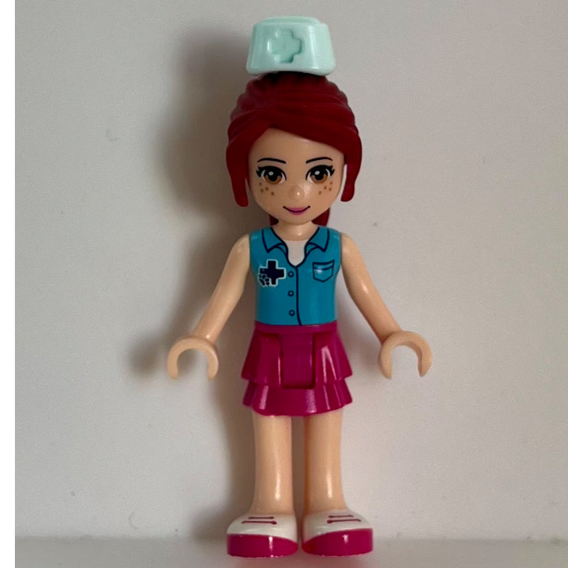 fig-010318 – Mia - Medium Azure Shirt, Magenta Skirt, Veterinarian, Nurse Hat