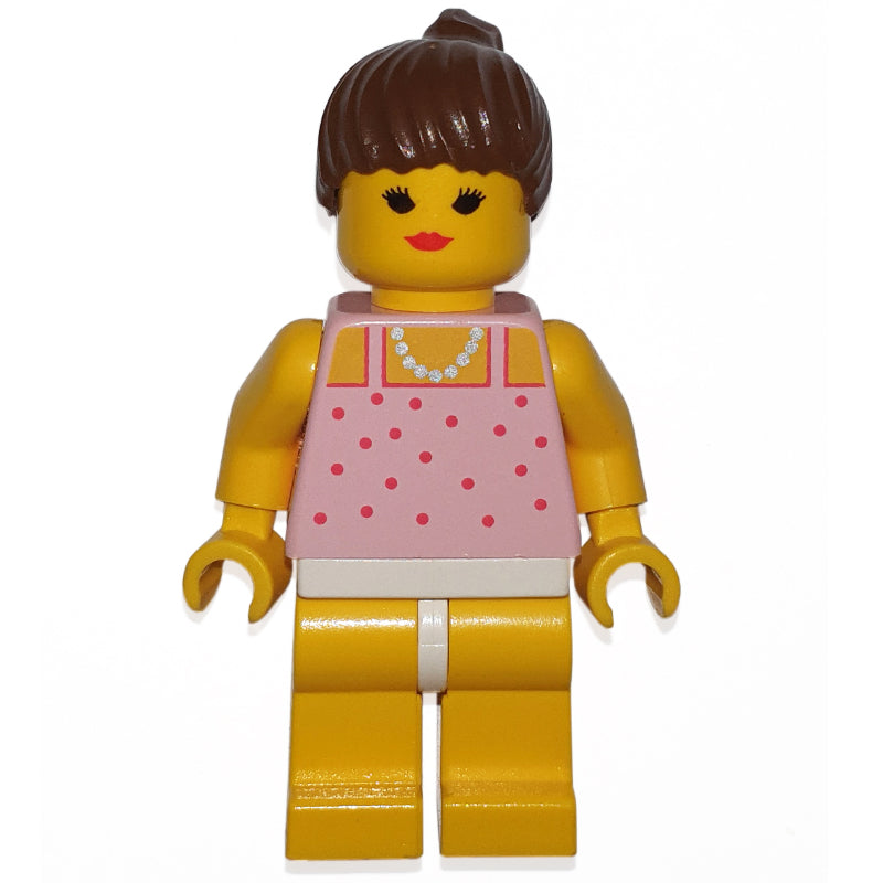 fig-010383 – Woman, Pink Top with Spots, Yellow Legs, Brown Hair - Closed Mouth