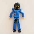 fig-010496 – Technic Figure Blue Legs, Blue Top with Technic Logo, Black Hair and Sunglasses - Black Helmet