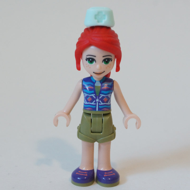 fig-010594 – Mia - Dark Purple Top, Olive Green Skirt, Nurse Hat