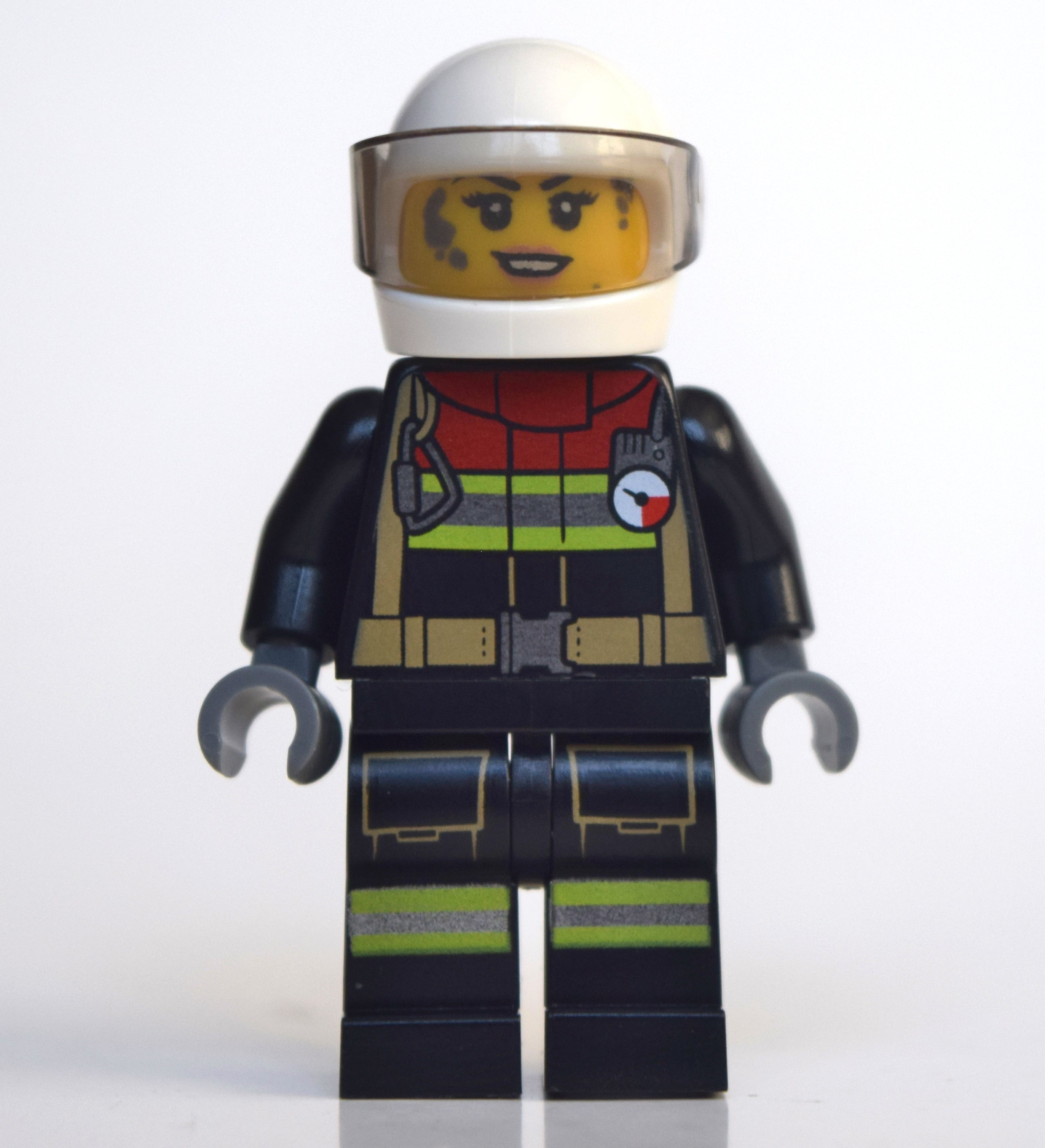 fig-010783 – Firewoman, Firesuit with Straps and Gauge, White Helmet with Visor, Dirty Face