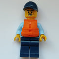 fig-010852 – Policeman, Bright Light Blue Shirt with Tie and Police Badge, Dark Blue Cap, Moustache