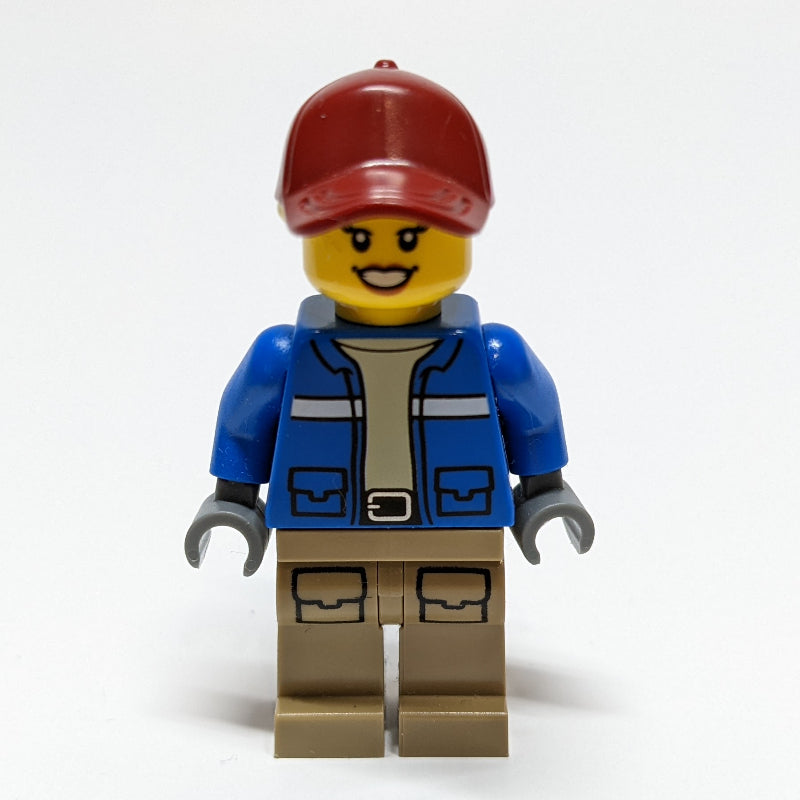 fig-011426 – Woman, Blue Jacket, Dark Red Cap