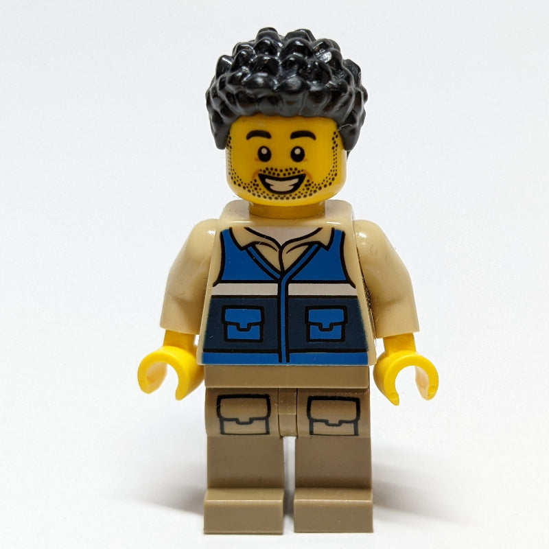 fig-011428 – Man, Blue Vest, Black Hair