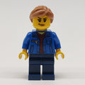 fig-011831 – Woman, Blue Jacket, Dark Blue Legs, Medium Nougat Hair