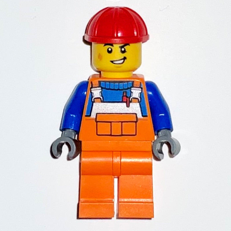 fig-012000 – Construction Worker, Orange Overalls, Red Hard Hat