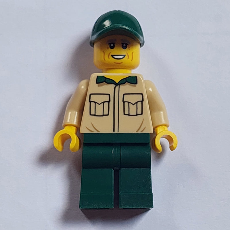 fig-012165 – Man, Tan Shirt, Dark Green Legs and Cap