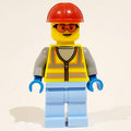 fig-012166 – Man, Vibrant Yellow Safety Vest, Bright Light Blue Legs, Red Hard Hat