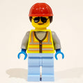 fig-012172 – Woman, Vibrant Yellow Safety Vest, Red Hard Hat