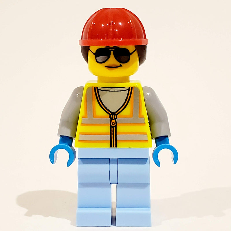 fig-012172 – Woman, Vibrant Yellow Safety Vest, Red Hard Hat