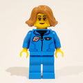 fig-012323 – Astronaut, Dark Azure Jumpsuit, Medium Nougat Hair