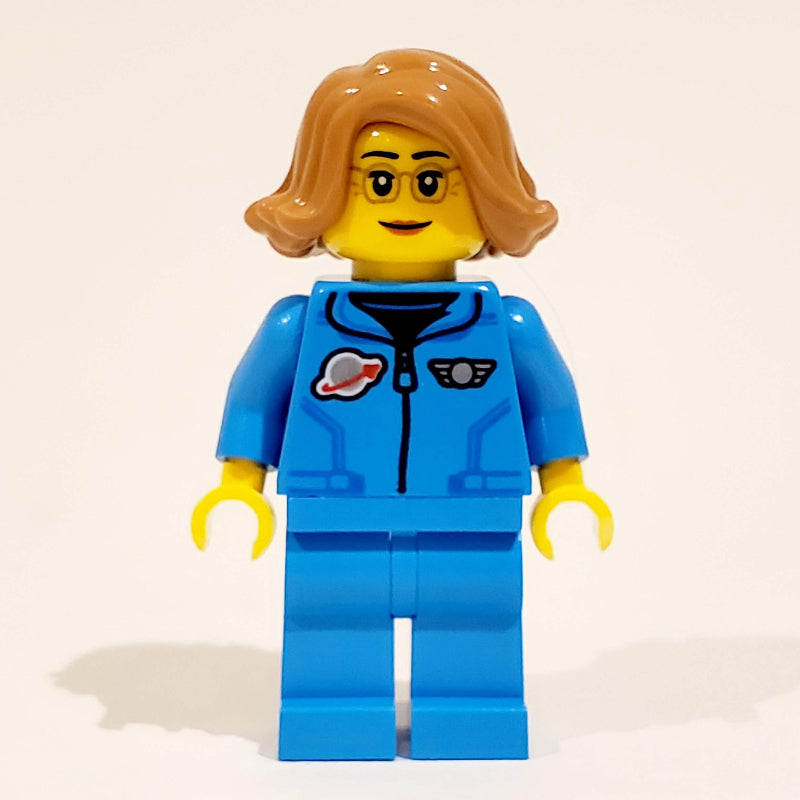 fig-012323 – Astronaut, Dark Azure Jumpsuit, Medium Nougat Hair