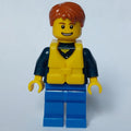 fig-012412 – Man, Dark Blue Plaid Shirt, Blue Legs, Dark Orange Hair, Yellow Life Vest