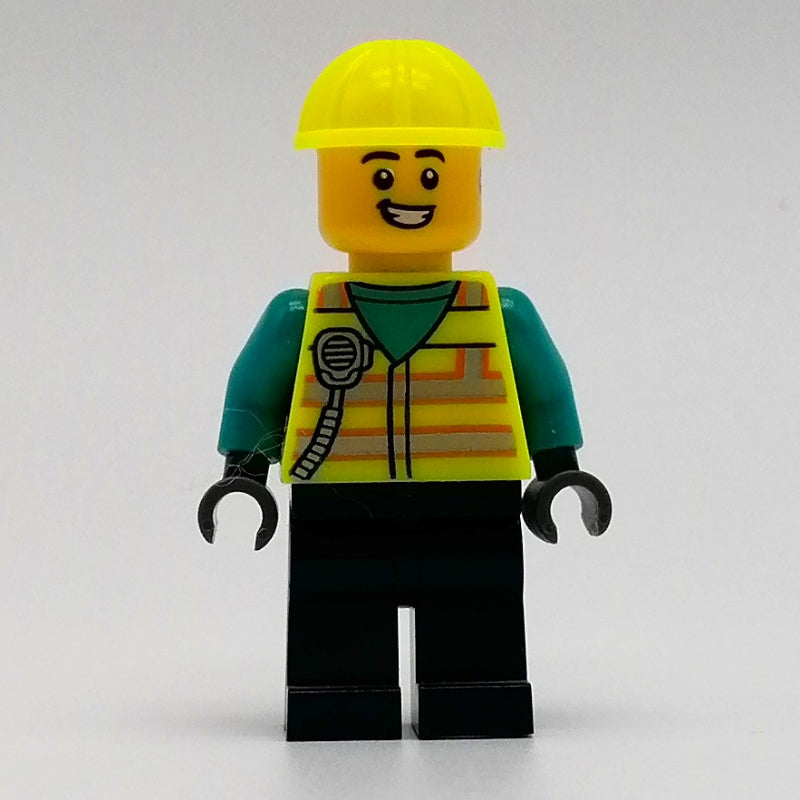 fig-012772 – Man, Vibrant Yellow Safety Vest and Helmet