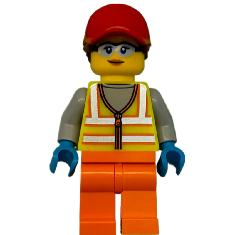 fig-012806 – Woman, Vibrant Yellow Safety Vest, Orange Legs, Red Cap, Safety Glasses