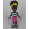 fig-012825 – Nandi - Dark Turquoise Top, Dark Pink Skirt, Yellow Ribbon