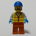 fig-013322 – Man, Vibrant Yellow Safety Vest, Dark Orange Legs, Blue Cap
