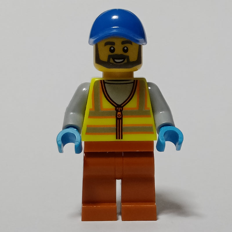 fig-013322 – Man, Vibrant Yellow Safety Vest, Dark Orange Legs, Blue Cap