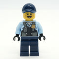 fig-013351 – Police Officer, Bright Light Blue Shirt with Police Badge, Dark Blue Legs and Cap, Moustache