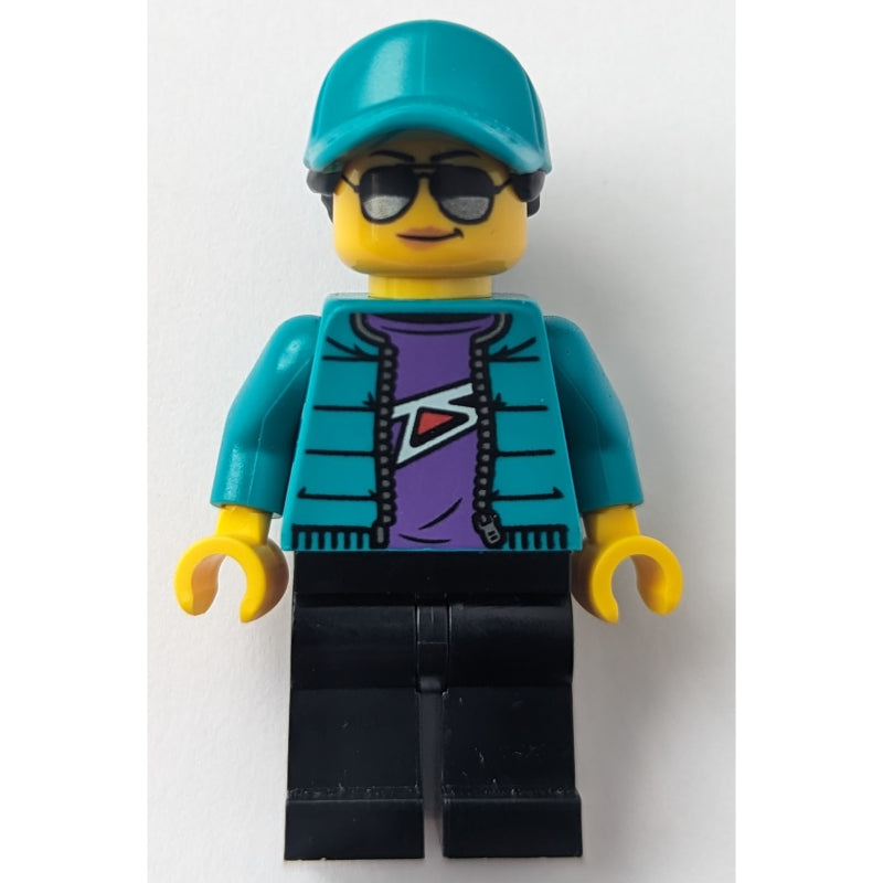 fig-013357 – Woman, Dark Turquoise Jacket and Cap, Black Legs