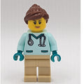 fig-013366 – Vet, Light Aqua Shirt, Tan Legs, Reddish Brown Ponytail