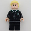 fig-013541 – Draco Malfoy, Closed Slytherin Robes with Crest