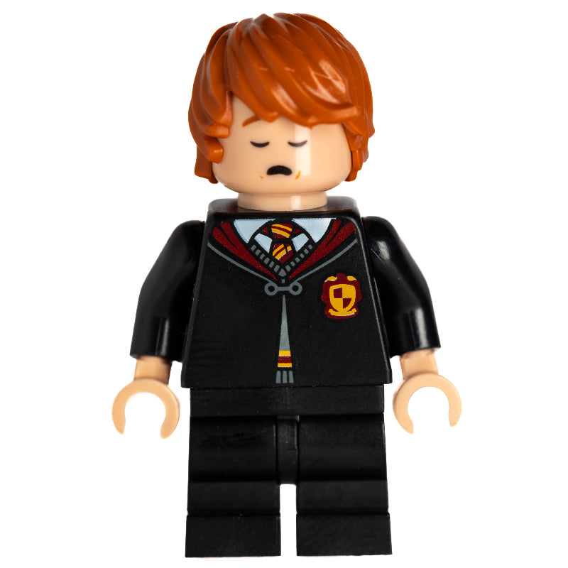 fig-013564 – Ron Weasley, Gryffindor Robes, Sleeping