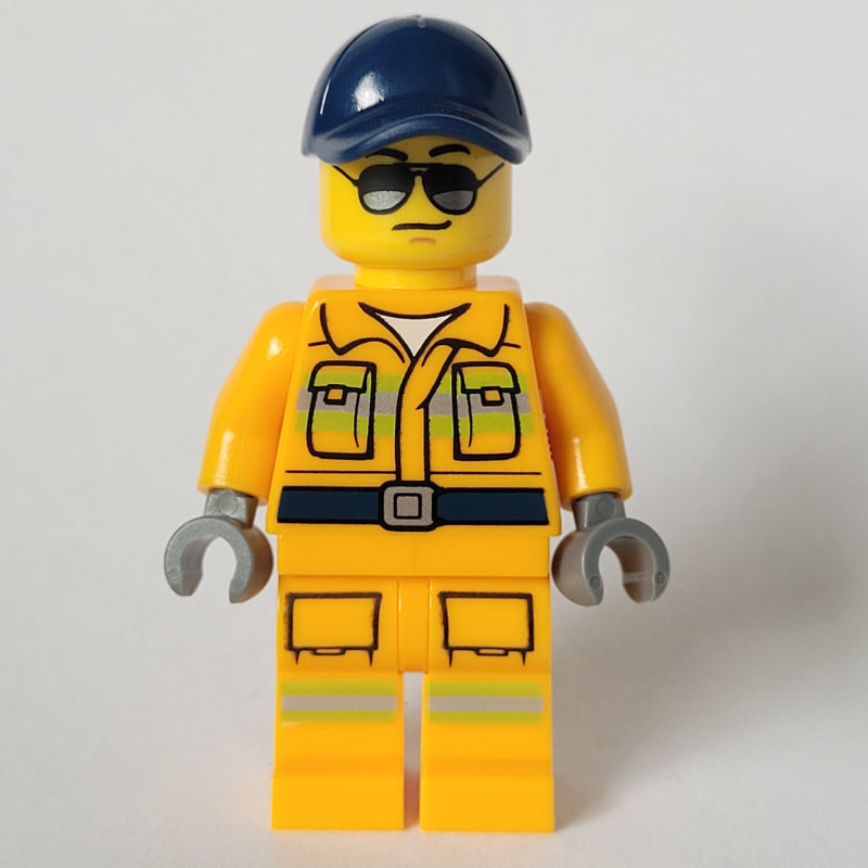 fig-013584 – Firefighter, Bright Light Orange Fire Suit, Dark Blue Cap