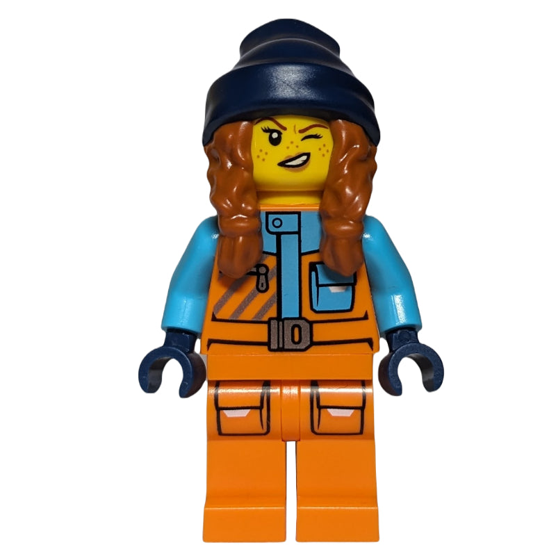 fig-013975 – Arctiv Explorer, Tina Tarantula, Orange Suit, Dark Blue Beanie with Hair