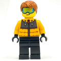 fig-013984 – Snow Tuber, Bright Light Orange Jacket, Black Legs