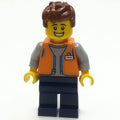 fig-013991 – Shopkeeper, Orange Vest, Dark Blue Legs, Reddish Brown Hair
