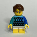 fig-015007 – Kid, Medium Azure Torso, White Legs with Yellow Feet, Reddish Brown Hair