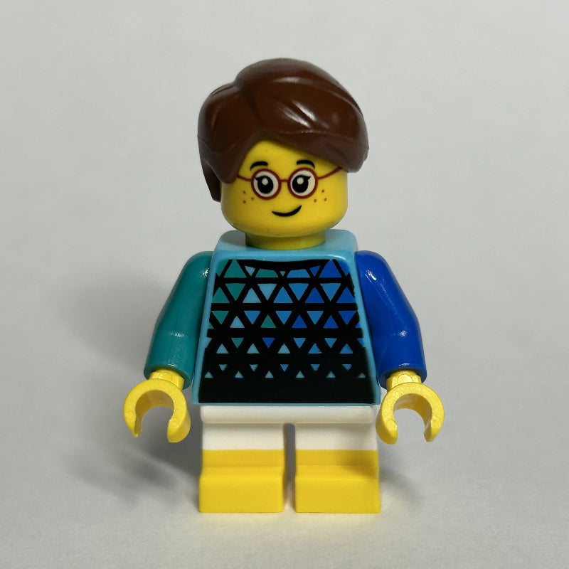 fig-015007 – Kid, Medium Azure Torso, White Legs with Yellow Feet, Reddish Brown Hair