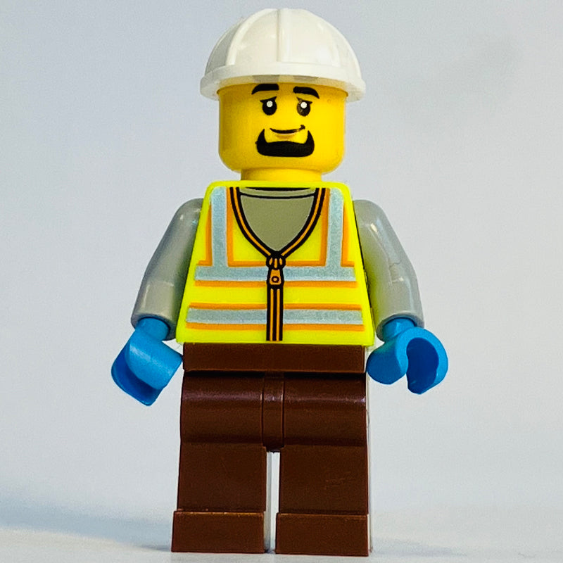 fig-015246 – Harbor Worker, Vibrant Yellow Safety Vest, Reddish Brown Legs, White Helmet