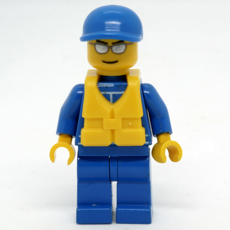 fig-016117 – Racer, Blue Jumpsuit with Octan Logo, Blue Cap, Yellow Life Vest 97895, Silver Sunglasses