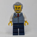 fig-016387 – Train Operator, Sand Blue Vest, Dark Blue Legs