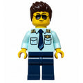 fig-016411 – Pilot, Light Aqua Shirt, Dark Blue Legs, Dark Bronw Hair
