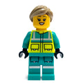 fig-017283 – Paramedic, Vibrant Yellow Safety Vest, Dark Turquoise Legs, Dark Tan Hair